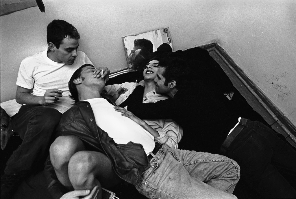 Vicky’s friends smother them with kisses at a party. Mexico City 1997